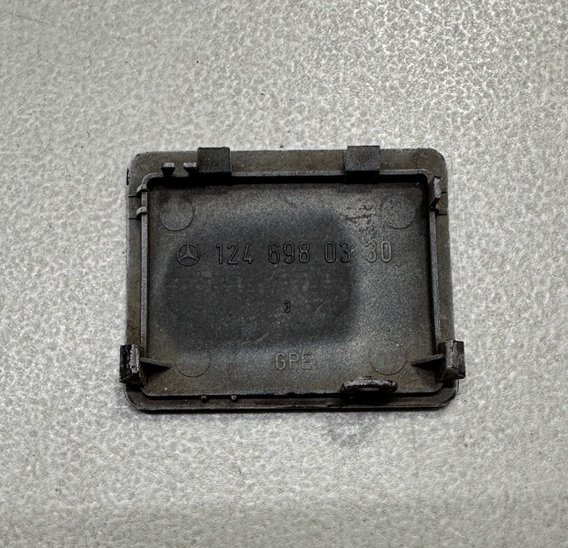 Mercedes-Benz OEM W124 Jack Hole Cap Panel Flap Cover 1246980330  