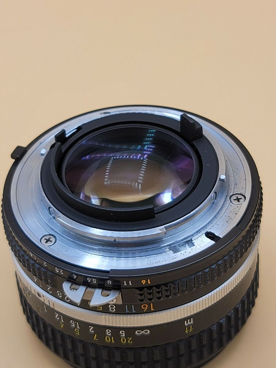 NIKON FM2 Sliver W/Nikon nikkor 50mm 1:1.4 Lens **PLEASE NIKON FM2 Sliver W/Nikon nikkor 50mm 1:1.4 Lens **PLEASE