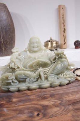 Maitreya Buddha statue carved from natural onyx stone.