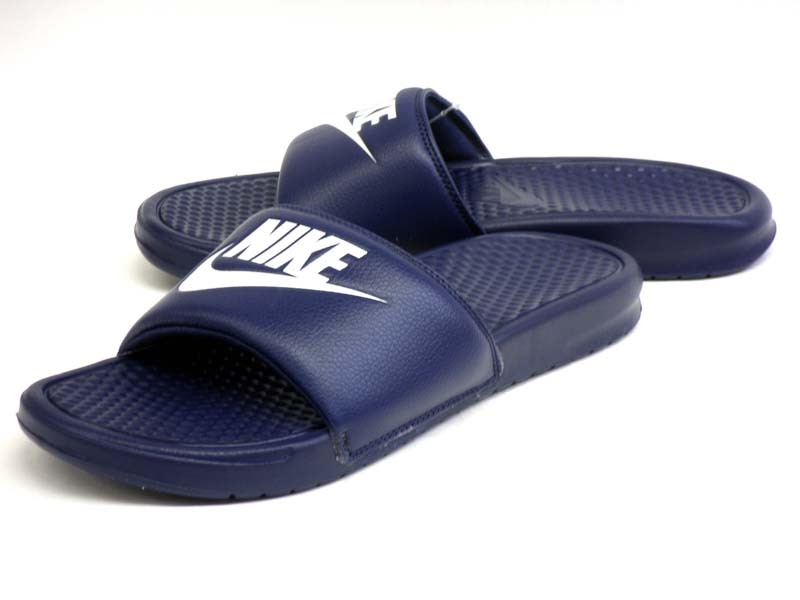 navy blue nike flip flops