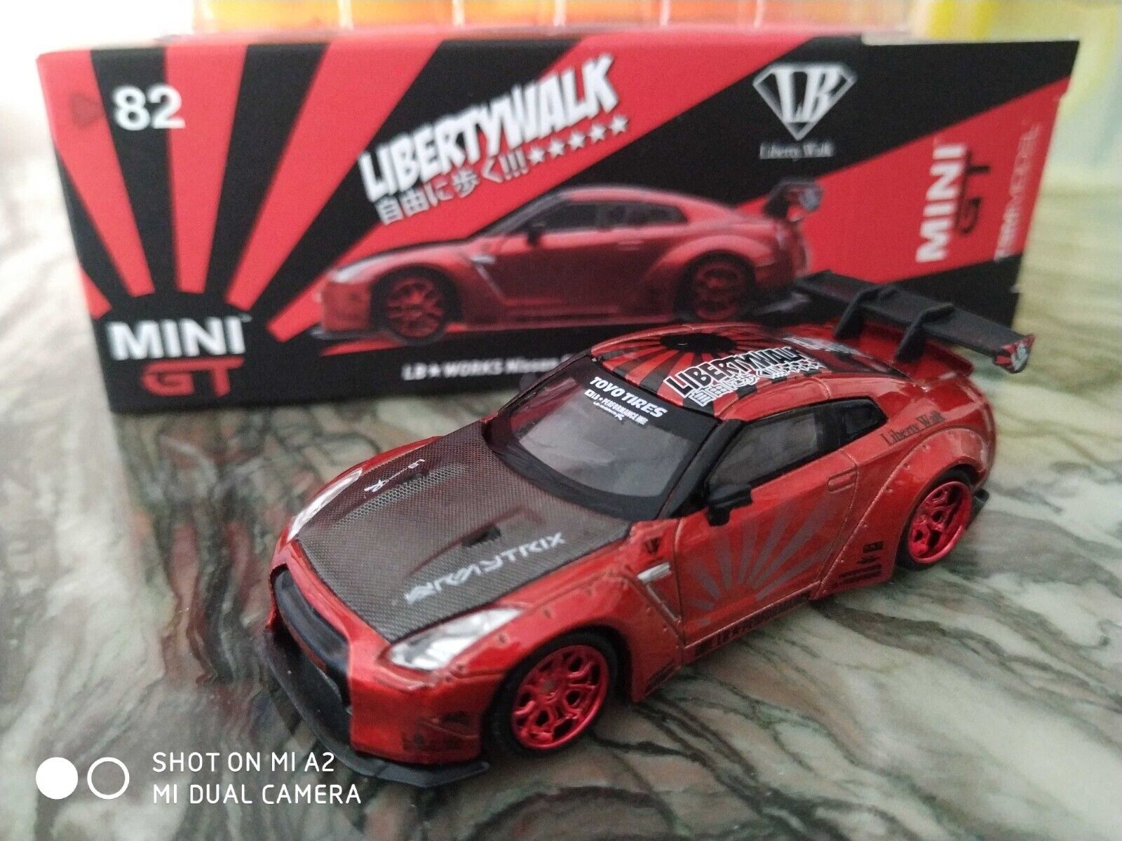 MINI GT 82 Toysrus (used) Nissan GTR R35 Candy Red Japan Liberty Walk LB  Works