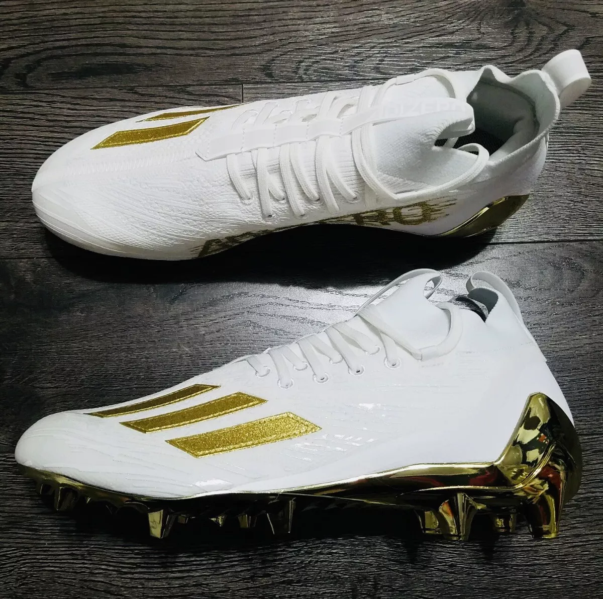 White and top gold cleats football