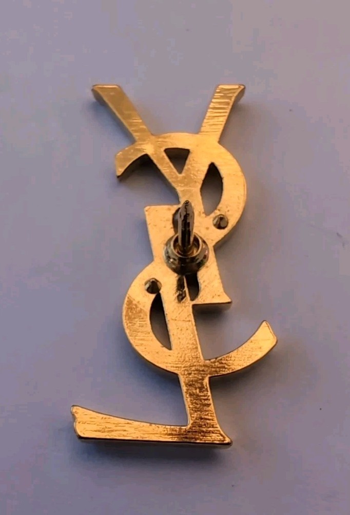 Broche Pin's YSL Monogramme Yves Saint Laurent Métal Doré 