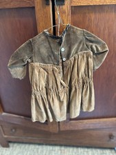 vintage small children's dress brown buttons on back wear on edges of sleeves
