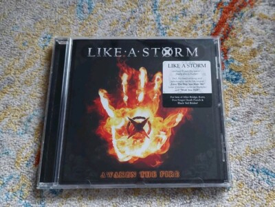 Like A Storm Awaken the Fire CD Disturbed Metal Three Days Grace Sick Puppies