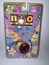 Vintage 1997 Playmates NANO BABY ORANGE Virtual Electronic Pet Sealed NIB