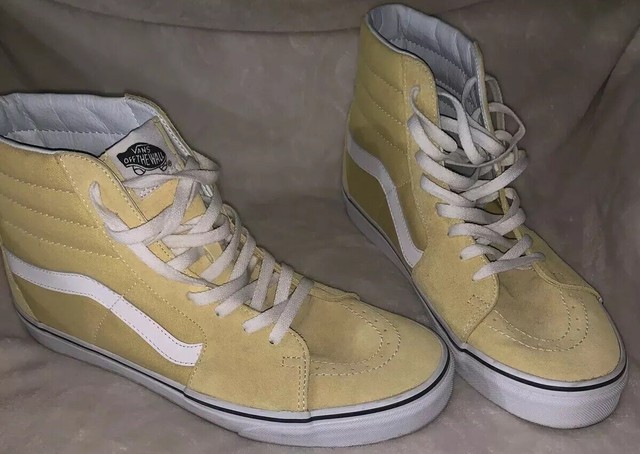 yellow and white high top vans