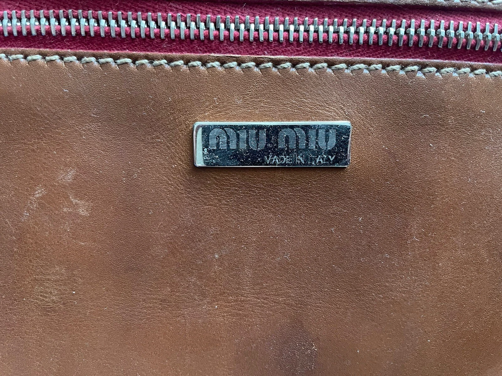 Pochette pochette Miu Miu in pelle marrone