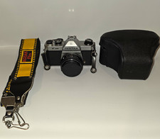 Asahi Pentax K1000 Silver 35mm SLR Film Camera with Pentax 50mm f/2 Lens.