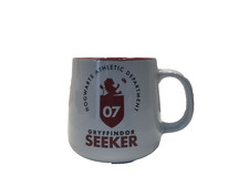 HAPPY POTTER HOGWARTS ATHLETIC DEPARTMENT GRYFFINDOR SEEKET MUG / CUP 2018