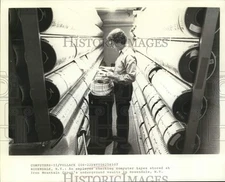 Press Photo Employee checks computer tapes at Iron Mountain Group's vaults in NY