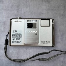 NIKON COOLPIX S1000pj Digital Camera Silver Black Built-in Projector 5x Zoom