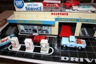 Vintage Marx Sears service station with cars and accessories