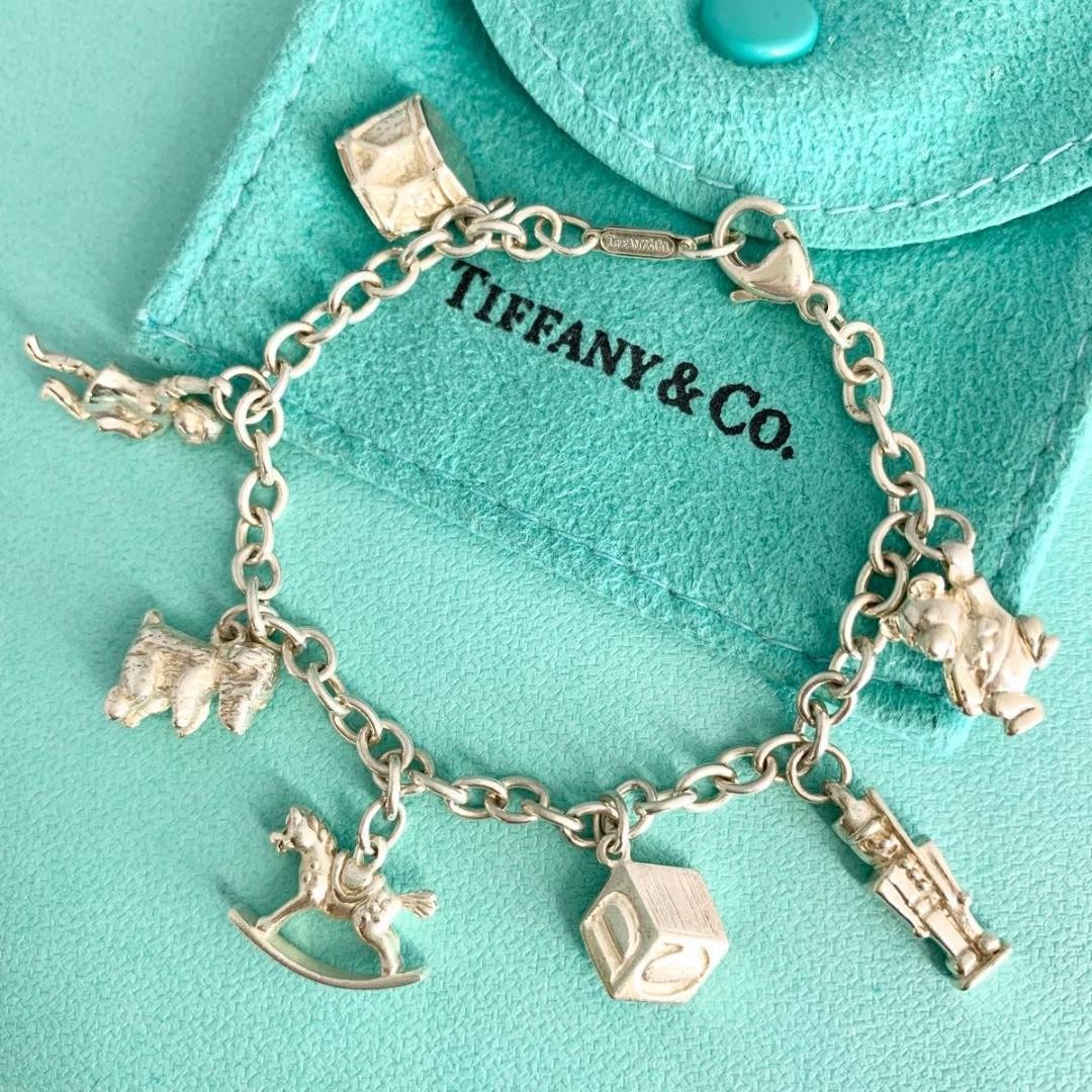Tiffany Old Rare 7-Line Charm Bracelet Featuring Wooden Horse Pendant