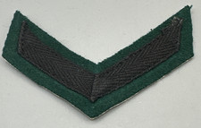 Chevron de campagne caporal lanceur armée pakistanaise avec une rayure noire sur laine vert foncé