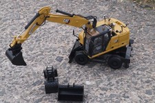 85956 - DCM -CAT M 318 Mobil Bagger Next Gene...