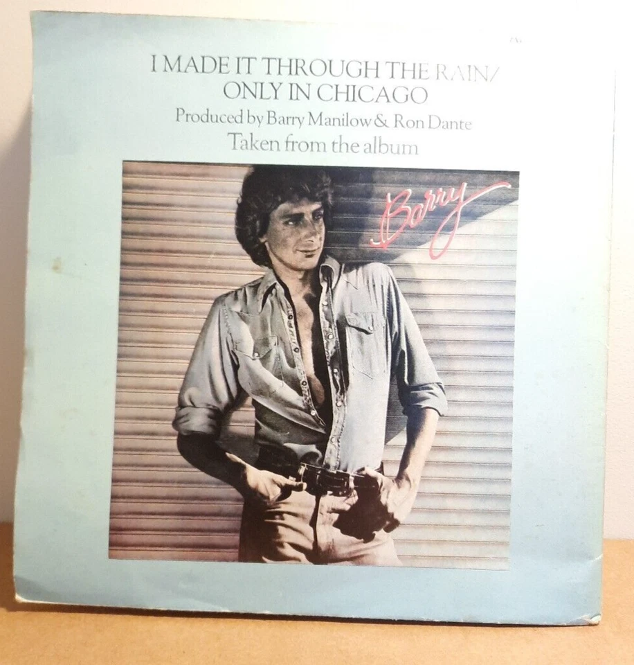 BARRY MANILOW-I MADE IT THROUGH THE RAIN 7"VINYL 45RPM ARISTA 385 POSTER SLEEVE Foto 2 de 4