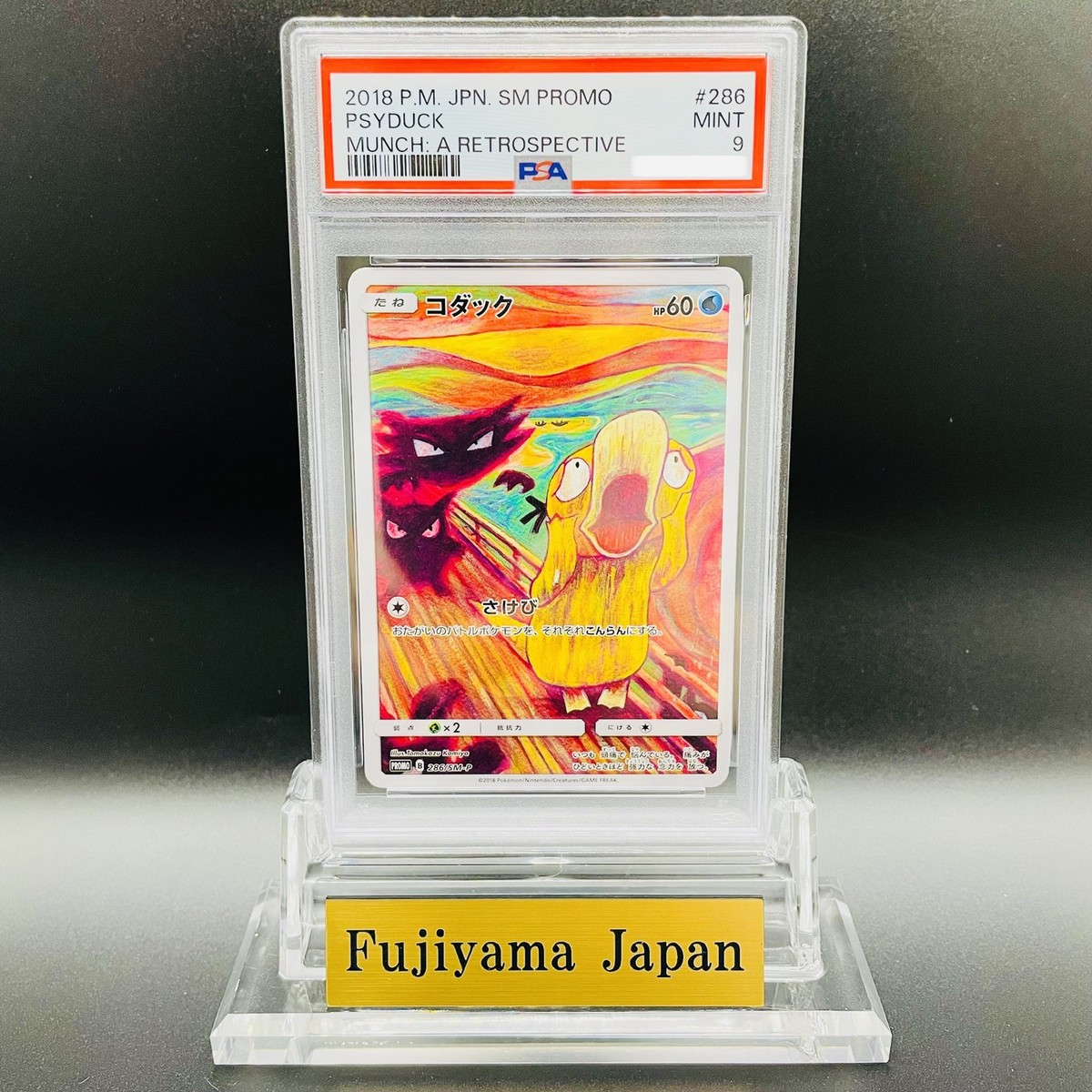 PSA 9 Psyduck Munch A The Scream 286/SM-P Promo 2018 Pokemon Card