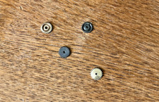 Variety of NMINT AFX 1 HTF Light Weight Large Hole  3 Small Hole Idler Gears