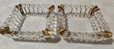 Set Of 2 Jeanette Glass Co.  Glass/crystal Ashtrays w/gold trim.