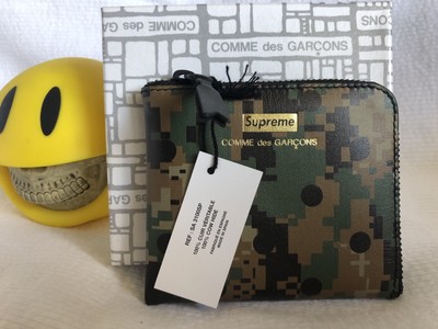 cdg x supreme wallet