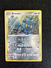 BRONZOR 129/192 REVERSE HOLO FRAGORE RIBELLE SPADA E SCUDO CARTA POKEMON ITA