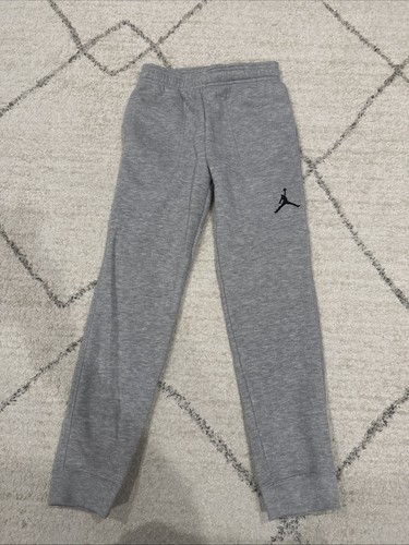 PANTALONES DEPORTIVOS NIÑOS NIKE AIR JORDAN GRIS JASPEADO 952648-042 TALLA M - Imagen 1 de 1