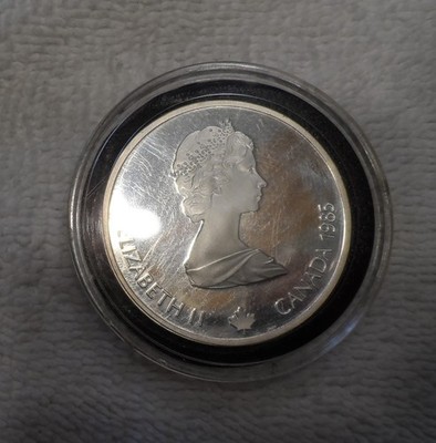 1985 Canada $20 Calgary 1988 Olympic Commemorative Coin (ASW-1 Troy OZ Silver)