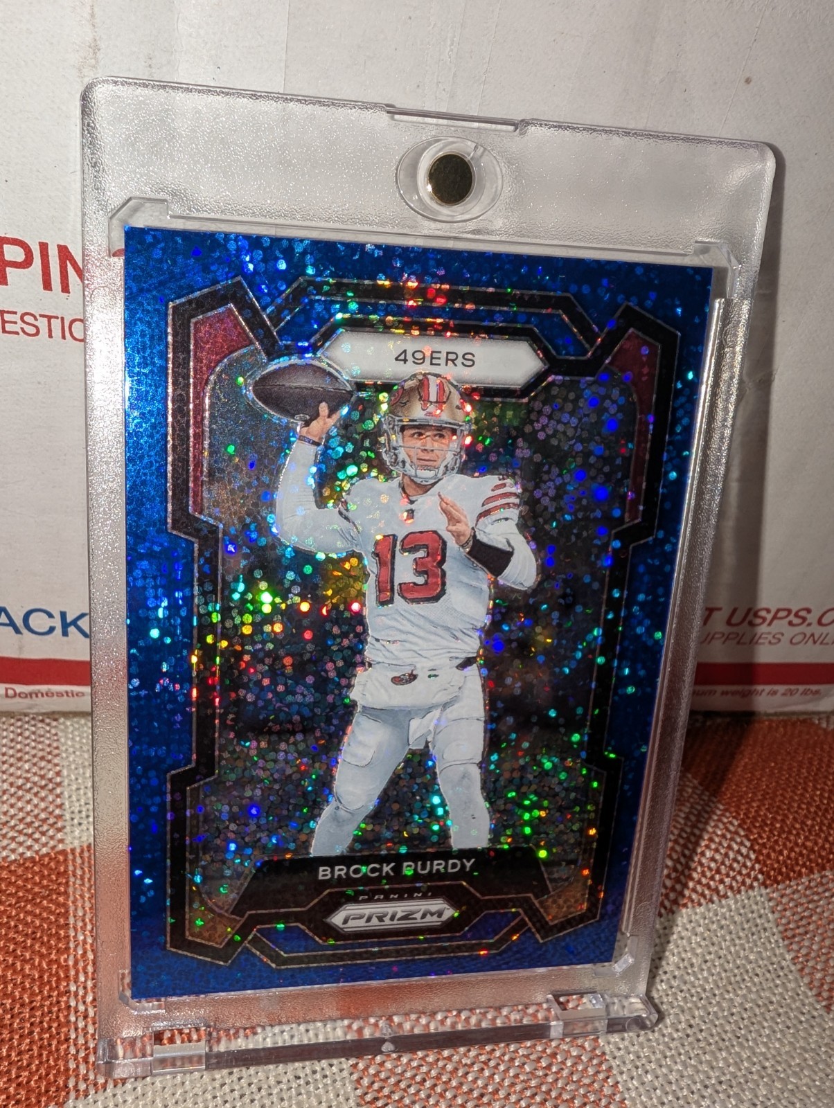 BROCK PURDY 2023 PRIZM FOOTBALL BLUE SPARKLE PRIZM 49ERS SP #266 /96