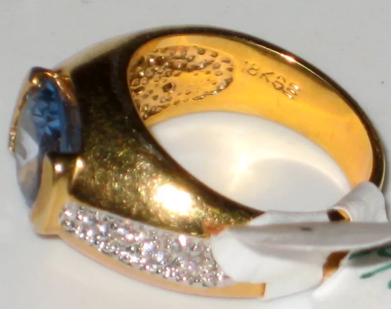 18KGE YELLOW GOLD RING WITH A CENTER BLUE STONE CZs eBay