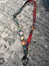 one piece lanyard Half Green And Half Red. Pins Are Included 