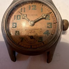 VINTAGE 1940's Geneva MILITARY MENS WATCH Copper colored dial luminous numerals