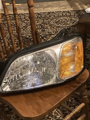 #ad Suburu Front 1 headlight SAE 935 702 05 $50.00