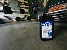 (1) Genuine Mopar Power Steering Fluid 68218064AC