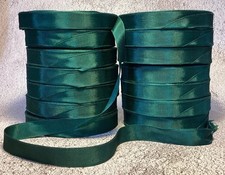 14 ROLLS OF APPROXIMATELY 50 YARDS EACH 3/4" GROSGRAIN DEEP HUNTER GREEN RIBBON