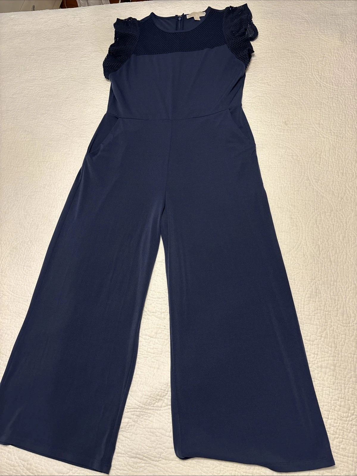 Tuta Michael Kors pezzo unico gamba ritagliata blu navy taglia media