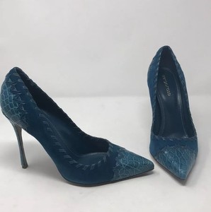 teal color pumps