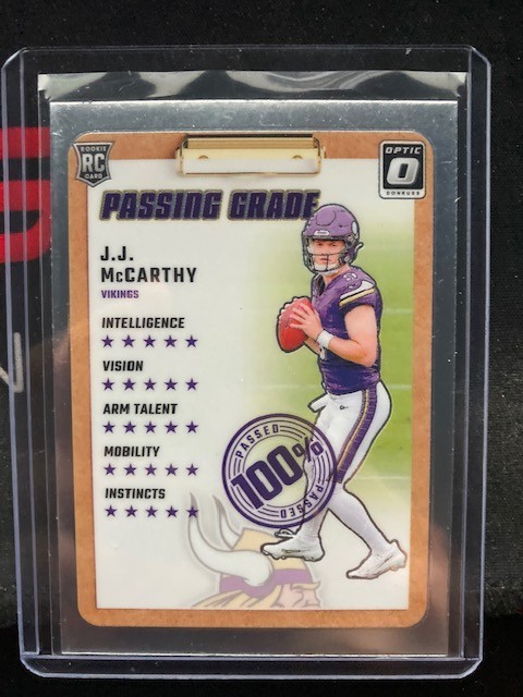 2024 Donruss Optic JJ McCarthy Passing Grade RC Rookie #6 Minnesota Vikings