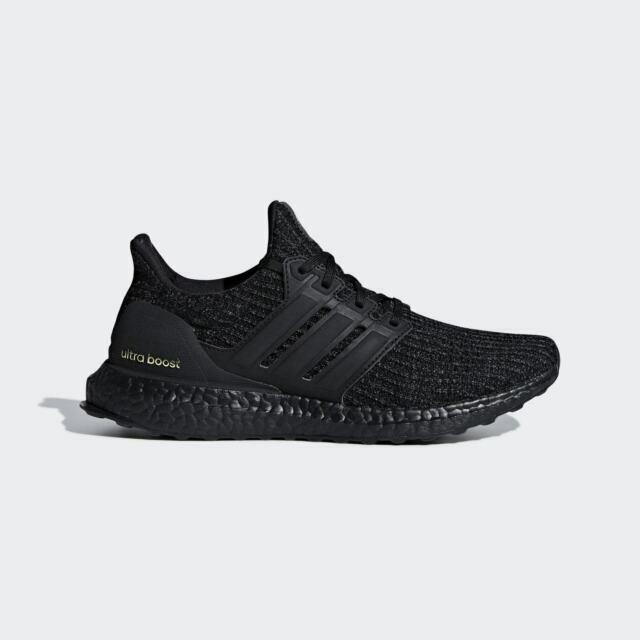 ultra boost triple black gold