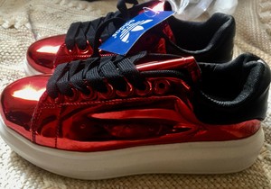 red shiny sneakers