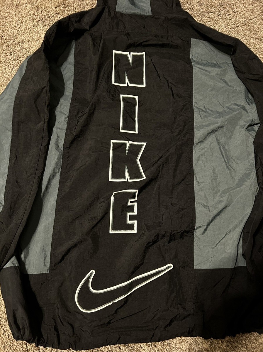 vintage nike forest green spell out windbreaker