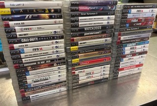 Lot jeux PS3 Total de 59 jeux divers titres en boîte d'origine et jacquettes.