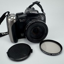 Canon PowerShot SX20 IS 12.1MP Digital Camera - Turns On With DC FOR PARTS AS IS