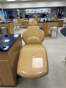 Dental Exam Chair with Attached Equipment and Monitor 2 are available