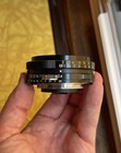 Nikon GN Auto Nikkor 45mm f2.8 Pancake Lens with Nikon L1A Filter + Nikon Caps — photo 6