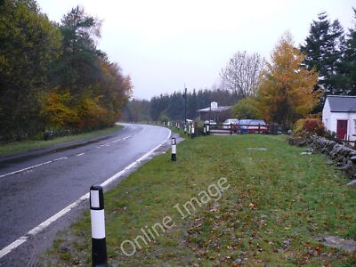 Photo 12x8 Glasnick Smithy Croft Kirkcowan View along the A75 on a wet Nov c2010