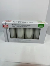 Merry Moments 4 Pc Flameless LED Candle set. White Vanilla Scented. New in box.