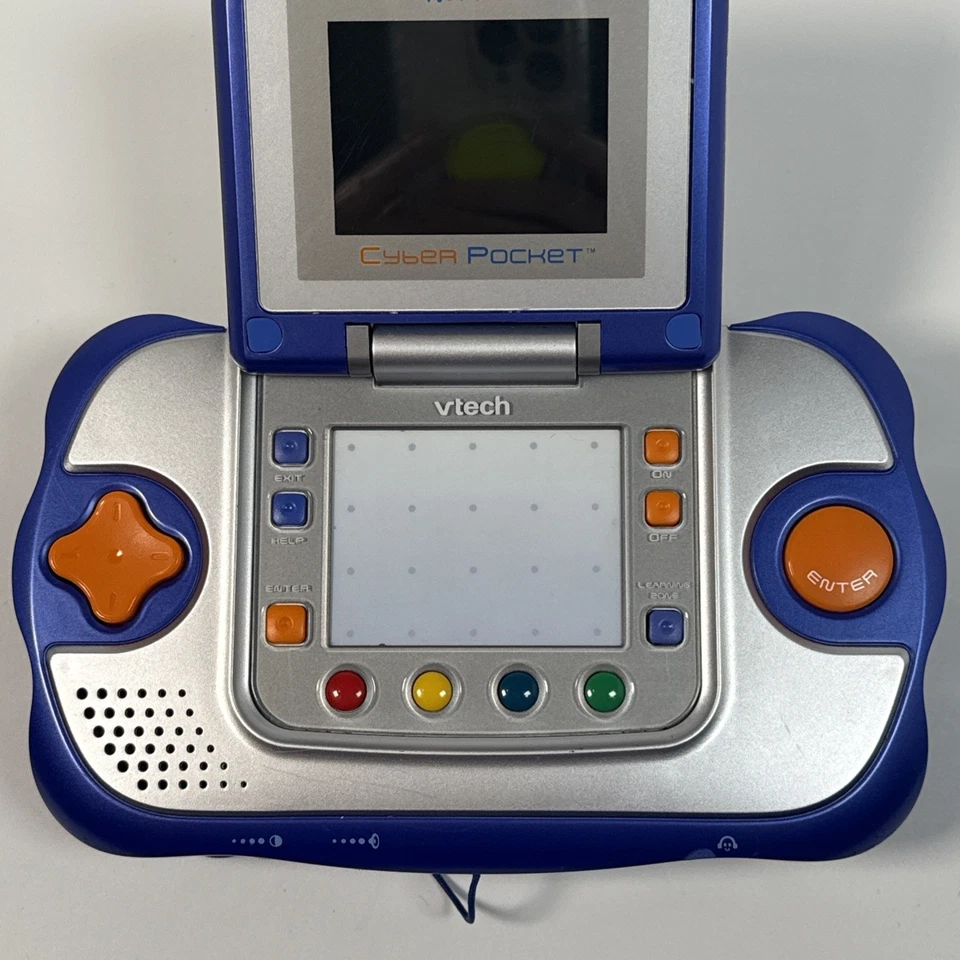 Sistema de aprendizaje VSmile Vtech Cyber Pocket probado incluye 2 juegos y adaptador de CA Foto 4 de 4
