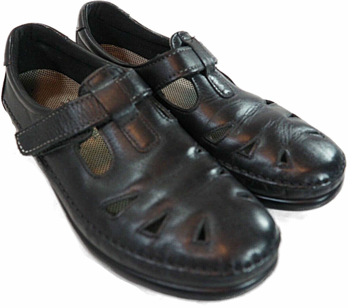 Black leather SAS Roamer women’s casual shoes with side cutouts, mesh straps, and visible air-cushion heels.