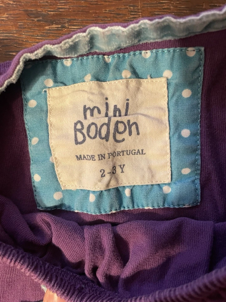 Camisa Mini Boden Niñas Talla 2-3Y Púrpura con Borde Aqua/Arco Foto 2 de 2